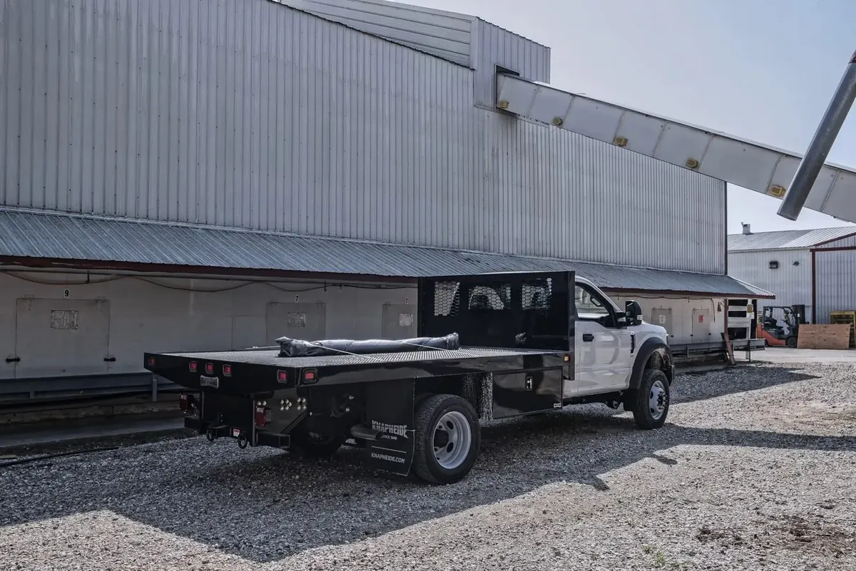 Knapheide platform stake body on a Ford F-550 chassis